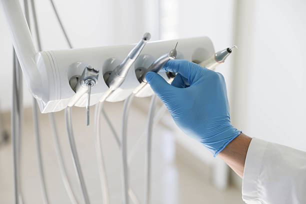 Professional Root Canal Treatment technician working in Myrtle Grove, FL